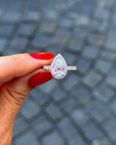 Pear-shaped diamond ring with pavé halo in 18K gold | Mara Megelea GIA Gemologist