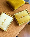 Mara Megelea branded jewelry boxes in gold | Swiss luxury jewelry presentation