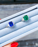 Blue sapphire and emerald engagement rings with trapezoid diamonds | Mara Megelea Swiss Jeweler