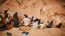 Artisanal miners working during ethical gemstone mining operation in Madagascar sourcing materials for fine jewelry
